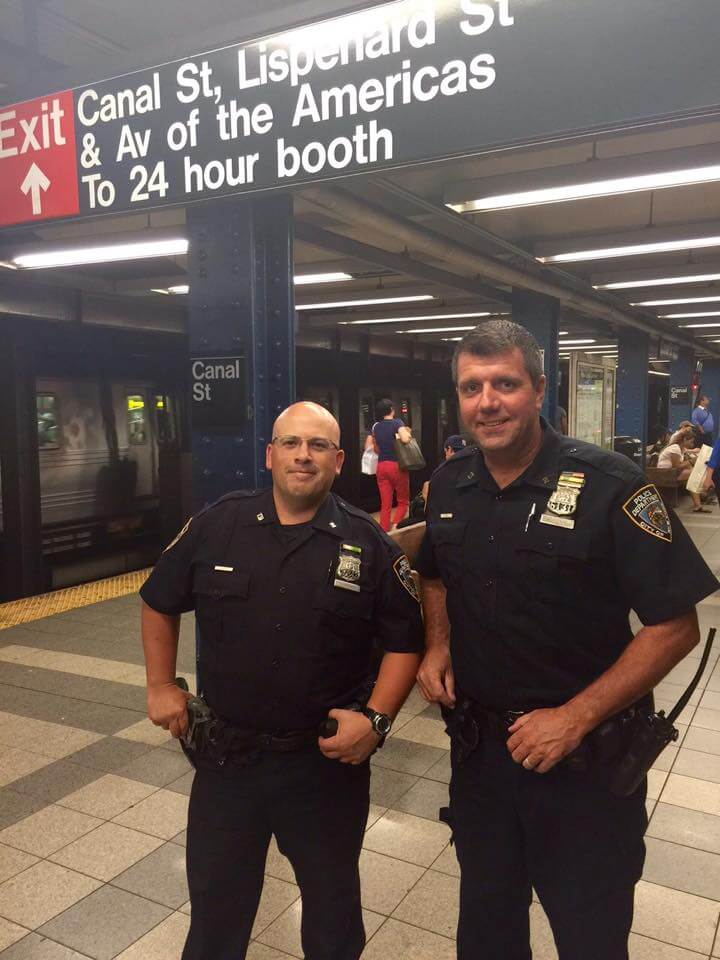 Police Stopped A Train And Jumped Into Subway Tracks To Rescue A Scared Cat